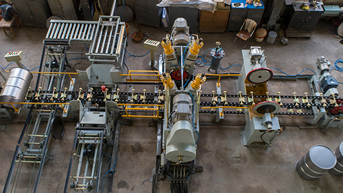 Ligne de production de fûts en acier à vitesse moyenne