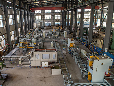 Equipement de fabrication de fûts en acier à grande vitesse